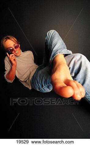 Teen boy on cell phone View Large Photo Image Stock Photo - Teen boy on cell phone. Fotosearch