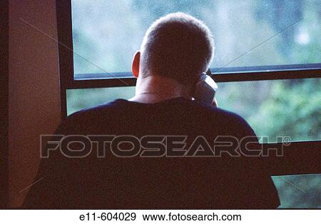 Teen boy on phone View Large Photo Image Stock Photo - Teen boy on phone. Fotosearch