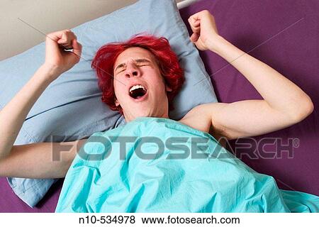 Teen boy, with dyed red hair, lying in bed View Large Photo Image Stock Photo - Teen boy, with dyed red hair, lying in bed. Fotosearch