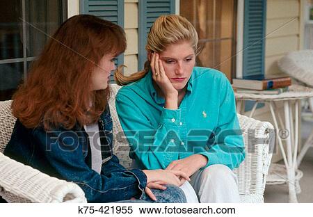 Teen consoling friend View Large Photo Image Stock Photography - Teen consoling friend. Fotosearch