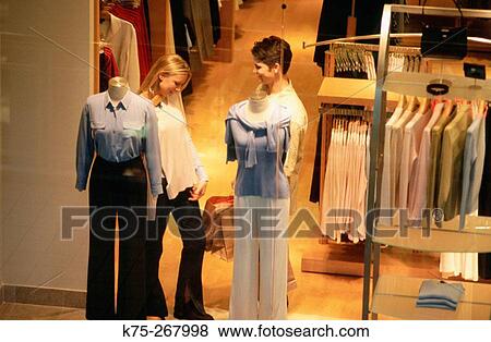 Teen couple shopping View Large Photo Image Stock Photo - Teen couple shopping. Fotosearch