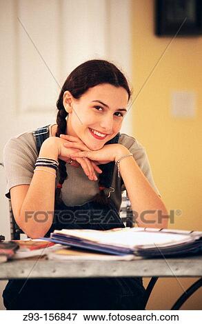 Teen girl does homework View Large Photo Image Stock Photo - Teen girl does homework. Fotosearch