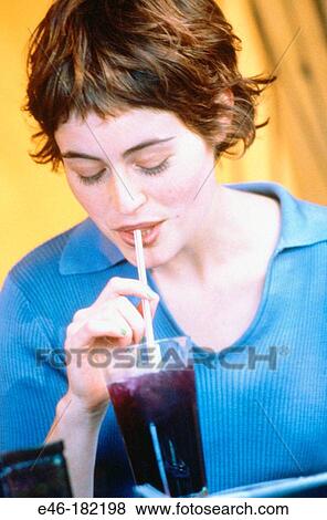 Stock Photo - Teen girl drinking. Fotosearch