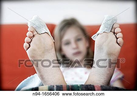 Teen girl in rehabilitation after an operation on the toes. View Large Photo Image Stock Photograph - Teen girl in rehabilitation after an operation on the toes.. Fotosearch