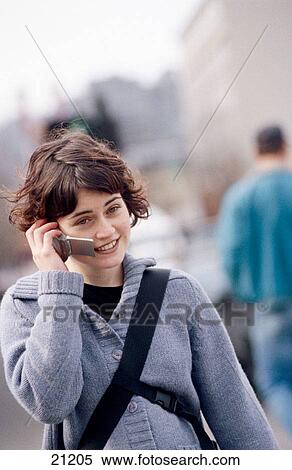 Teen girl on cell phone View Large Photo Image Stock Photography - Teen girl on cell phone. Fotosearch