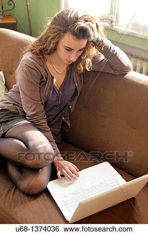 Teen girl using laptop computer View Large Photo Image Stock Photograph - Teen girl using laptop computer. Fotosearch
