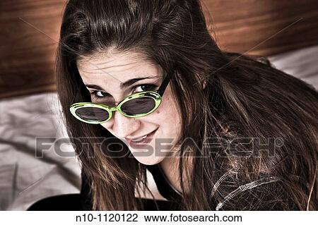 Teen girl wearing sunglasses View Large Photo Image Stock Image - Teen girl wearing sunglasses. Fotosearch