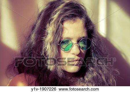 Teen girl wearing sunglasses View Large Photo Image Stock Photograph - Teen girl wearing sunglasses. Fotosearch