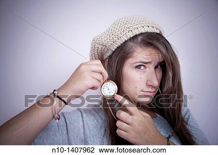 Teen girl with a pocket watch around her neck View Large Photo Image Stock Image - Teen girl with a pocket watch around her neck. Fotosearch