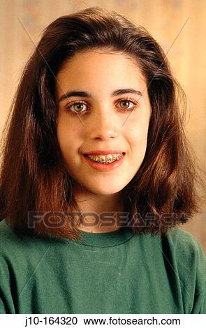 Teen girl with braces, Boston, MA View Large Photo Image Stock Image - Teen girl with braces, Boston, MA. Fotosearch