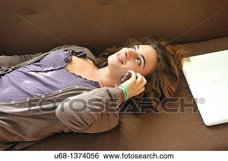 Teen girl with cell phone View Large Photo Image Stock Photograph - Teen girl with cell phone. Fotosearch