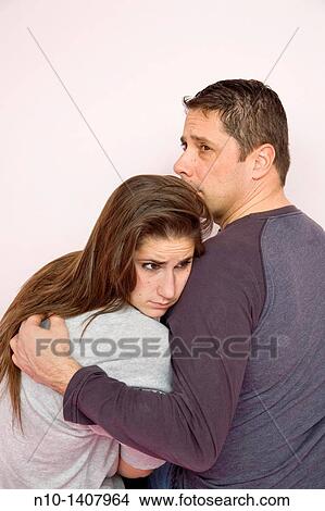 Teen girl with her father View Large Photo Image Picture - Teen girl with her father. Fotosearch