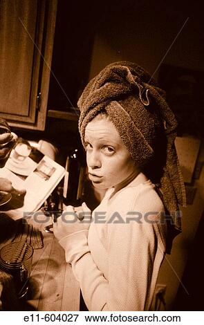 Teen girl with towel on her head View Large Photo Image Stock Photo - Teen girl with towel on her head. Fotosearch