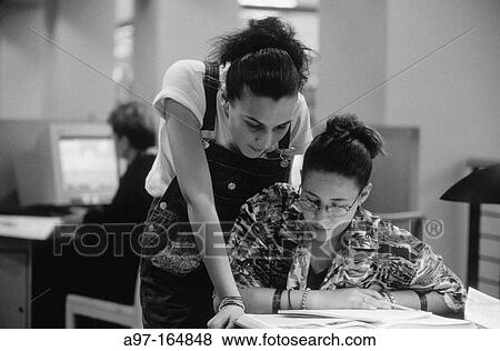 Teen girls study in library View Large Photo Image Stock Photo - Teen girls study in library. Fotosearch