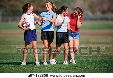 Teen girls with soccer ball View Large Photo Image Stock Photo - Teen girls with soccer ball. Fotosearch