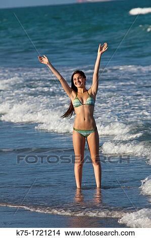 Teen happy to be at the beach View Large Photo Image Picture - Teen happy to be at the beach. Fotosearch