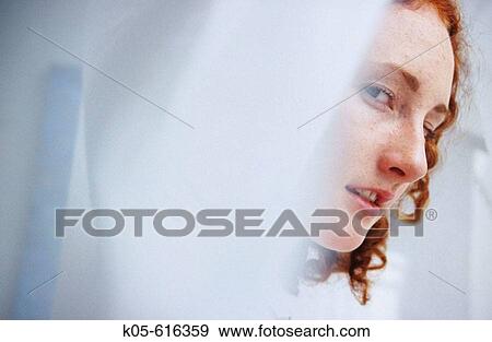 teen looking from behind curtain View Large Photo Image Stock Photo - teen looking from behind curtain. Fotosearch