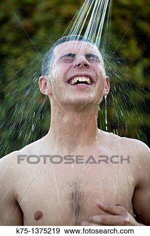 teen showering outdoors View Large Photo Image Stock Photo - teen showering outdoors. Fotosearch