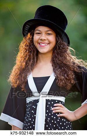 Stock Photo - Teen wearing top hat. Fotosearch
