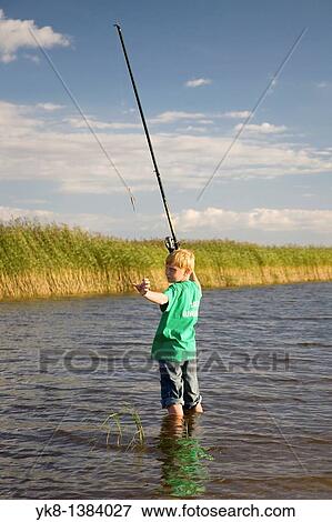 Teenage Boy Fishing by Lake V? rtsj? rv in Estonia View Large Photo Image Stock Photo - Teenage Boy Fishing by Lake V? rtsj? rv in Estonia. Fotosearch