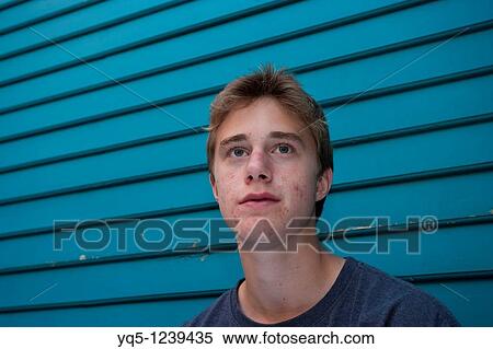 Stock Photography - teenage boy with acne. Fotosearch