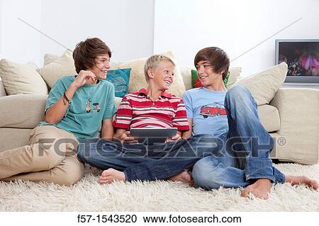 Teenage boys with Tablet View Large Photo Image Stock Image - Teenage boys with Tablet. Fotosearch