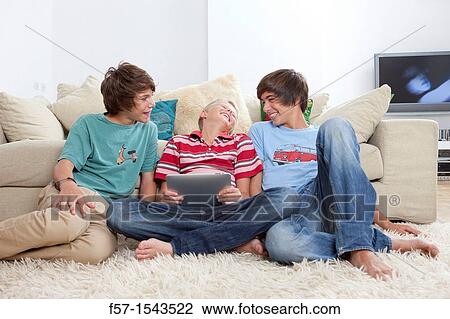 Teenage boys with Tablet View Large Photo Image Stock Image - Teenage boys with Tablet. Fotosearch