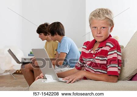 Teenage boys with Tablet View Large Photo Image Stock Photo - Teenage boys with Tablet. Fotosearch