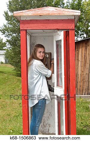 Stock Image - teenage girl, 15, at the museum in Pincher Creek, Alberta, Canada. Fotosearch
