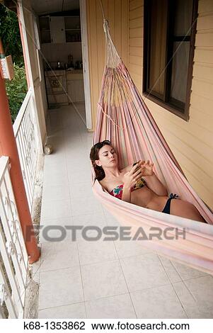 teenage girl on holiday at the beach in the tropics View Large Photo Image Stock Image - teenage girl on holiday at the beach in the tropics. Fotosearch