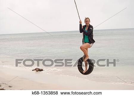 teenage girl on holiday at the beach in the tropics View Large Photo Image Stock Photo - teenage girl on holiday at the beach in the tropics. Fotosearch