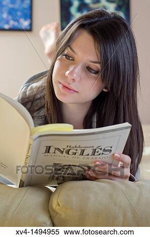 Teenage girl reading on bed View Large Photo Image Stock Photography - Teenage girl reading on bed. Fotosearch