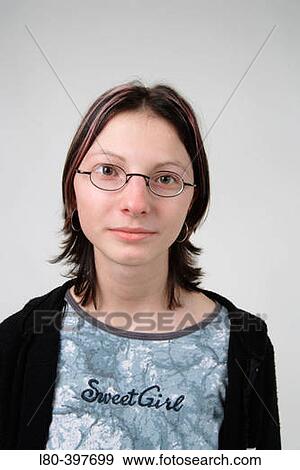 Teenage girl with glasses View Large Photo Image Stock Photo - Teenage girl with glasses. Fotosearch