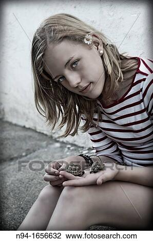 Teenage girl with hand pet turtle. View Large Photo Image Stock Image - Teenage girl with hand pet turtle.. Fotosearch