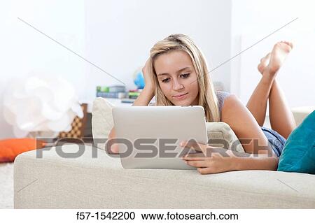 Teenage girl with tablet View Large Photo Image Stock Image - Teenage girl with tablet. Fotosearch