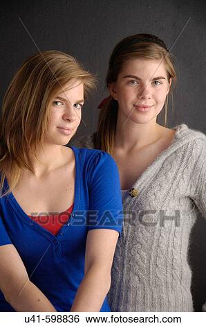 Stock Photograph - teenage sisters. Fotosearch