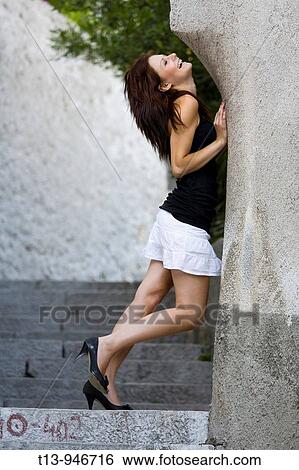 Teenage woman happy in town View Large Photo Image Stock Photograph - Teenage woman happy in town. Fotosearch