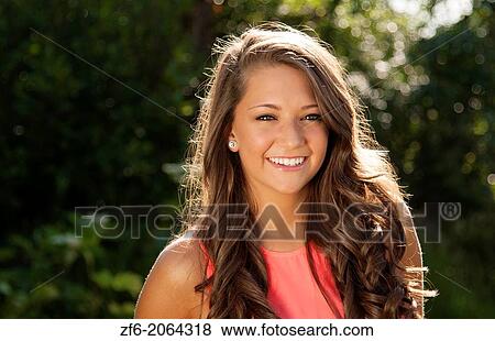 Teenager girl clean makeup smile outdoors seventeen beauty face in sunshine backlit happy teen with great hair. View Large Photo Image Stock Photo - Teenager girl clean makeup smile outdoors seventeen beauty face in sunshine backlit happy teen with great hair.. Fotosearch