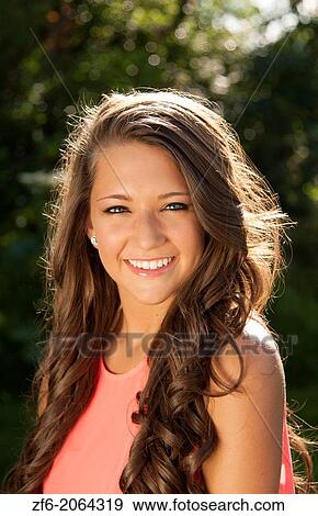Teenager girl clean makeup smile outdoors seventeen beauty face in sunshine backlit happy teen with great hair. View Large Photo Image Stock Photo - Teenager girl clean makeup smile outdoors seventeen beauty face in sunshine backlit happy teen with great hair.. Fotosearch