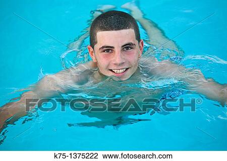 Teenager in pool View Large Photo Image Stock Image - Teenager in pool. Fotosearch