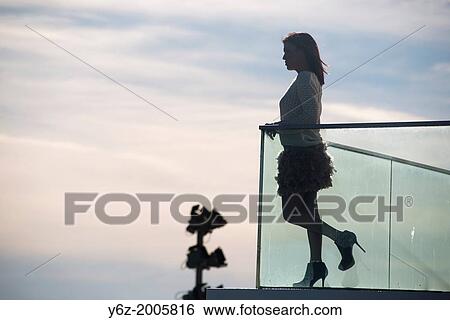 Stock Photograph - Teenager posing outdoors.. Fotosearch