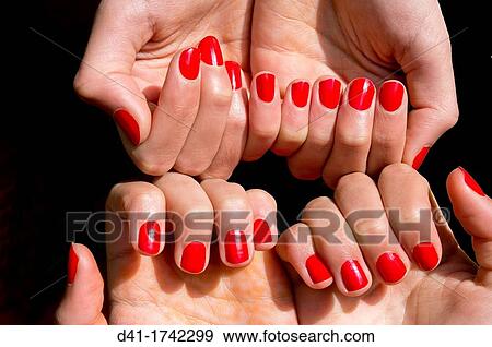 Stock Photo - teenager red nails. Fotosearch