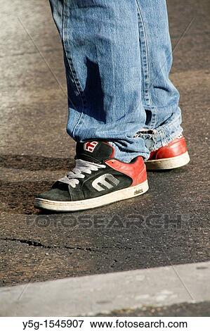 teenager shoes standing in street View Large Photo Image Stock Photo - teenager shoes standing in street. Fotosearch