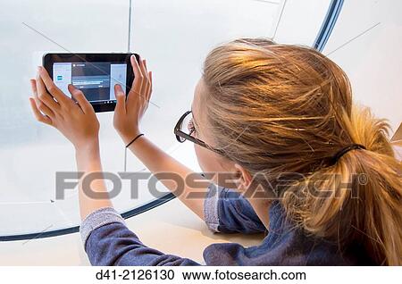 Stock Image - Teenager Tablet.. Fotosearch