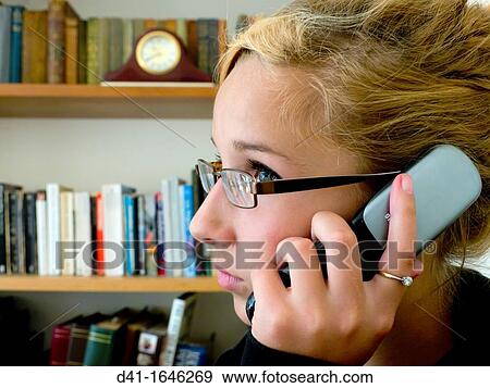 Stock Photo - Teenager talking on phone. Fotosearch