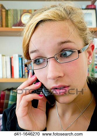 Teenager talking on phone surprised View Large Photo Image Stock Image - Teenager talking on phone surprised. Fotosearch