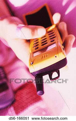 Teenager using cell phone View Large Photo Image Stock Image - Teenager using cell phone. Fotosearch