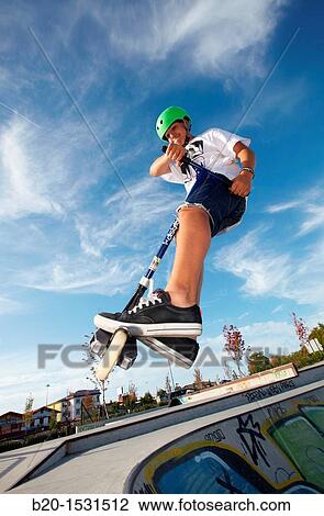 Teenager with city scooter in Skate park, Irun, Gipuzkoa, Euskadi, Spain View Large Photo Image Stock Image - Teenager with city scooter in Skate park, Irun, Gipuzkoa, Euskadi, Spain. Fotosearch