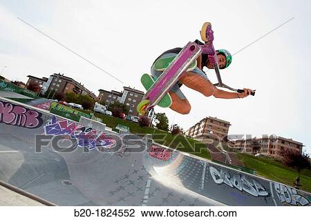 Teenager with city scooter in Skate park, Leioa, Bizkaia, Basque Country, Spain View Large Photo Image Stock Image - Teenager with city scooter in Skate park, Leioa, Bizkaia, Basque Country, Spain. Fotosearch