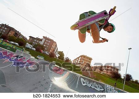 Teenager with city scooter in Skate park, Leioa, Bizkaia, Basque Country, Spain View Large Photo Image Stock Image - Teenager with city scooter in Skate park, Leioa, Bizkaia, Basque Country, Spain. Fotosearch